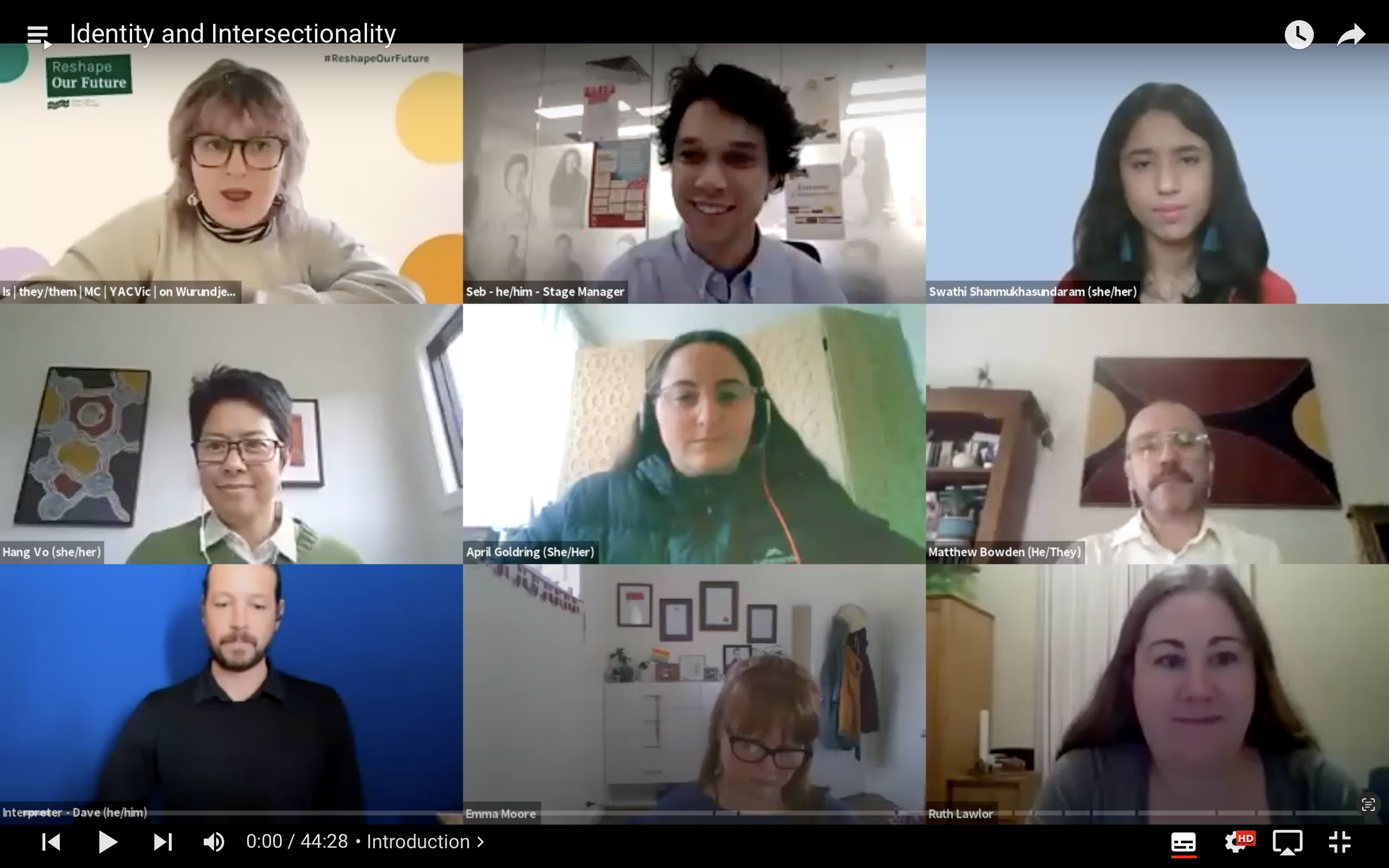 Screenshot of a YouTube video which is a Zoom screen with 9 faces on it.
